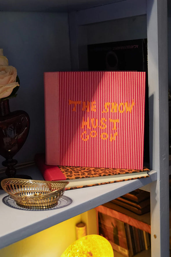 The Show Must Go On Photo Album