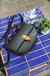 Round Tesoro Leather Bag